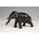 A Japanese patinated bronze model of an elephant, Meiji Period (1868-1912), possibly Tokyo school,