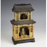 A Chinese carved soapstone pagoda, late 19th century, the sectional shrine carved with internal