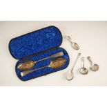 A cased pair of George III silver berry spoons, Peter and William Bateman, London 1807, the gilt