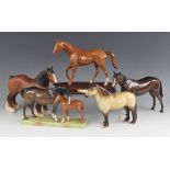 Three Beswick horse models comprising: 'Mare and Foal' model number 1811, in brown and chestnut,