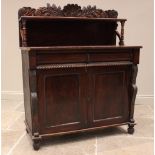 A William IV mahogany chiffonier sideboard, the raised back with a leaf and shell carved pediment