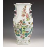 A Chinese porcelain famille verte hexagonal vase, 20th century, externally decorated with a
