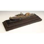A table lighter modelled as a torpedo boat, 20th century, the wooden hull with metal fittings