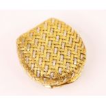 An early 20th century continental two tone yellow metal hinged pill box, the interwoven engraved