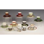 A selection of of silver mounted coffee cans, to include a silver mounted Royal Worcester cup