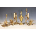 A collection of six brass and gilt metal desk lamps, to include a pair modelled as Griffins, 20cm H,