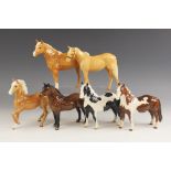 Six Beswick horses, comprising 'Palomino (Prancing Arab Type)', model number 1261 by Arthur