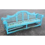 A blue painted Lutyens style hardwood bench, of typical slatted form with an arched back rest,