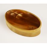 A horn snuff box, German (19th century), of oval form, 9cm long (at fault)