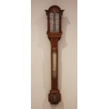 A Victorian carved oak stick barometer, signed Newton & Co, 3 Fleet Street, Temple Bar, London,