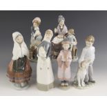 Six Lladro figures, late 20th century, comprising: "A Visit With Granny", 23cm high, "Festival