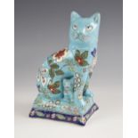 A French Longwy model of a cat with kitten, 20th century, with floral and foliate detail