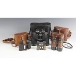 A cased pair of Carl Zeiss Jena DRP Feldstecher Vergr 8 binoculars, early 20th century, retailed