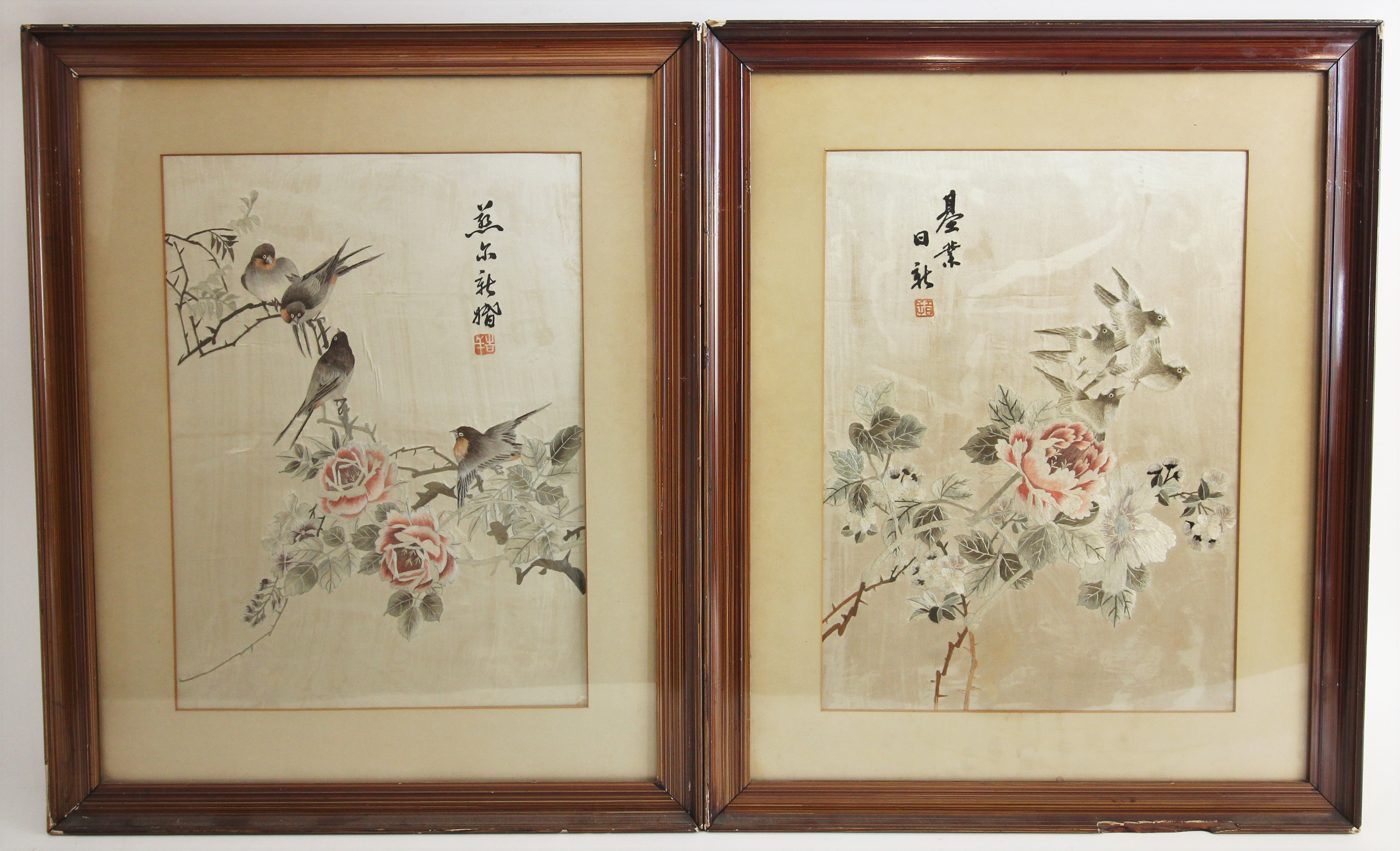 A pair of Chinese silk embroidered panels, late 19th century, each rectangular panel embroidered