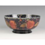 A Moorcroft footed bowl in the Pomegranate pattern, early 20th century, full William Moorcroft