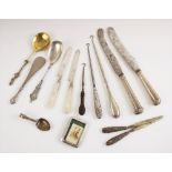 A selection of silver items, to include a pair of George III silver butter knife, possibly Samuel