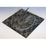 A 19th century bronze sundial, unsigned, the square section platform with a scale ground and central