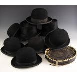 A silk covered and lined collapsible top hat, makers mark to interior, in associated box, 16cm high,