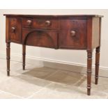 A 19th century mahogany bow front sideboard, the two central drawers flanked by a deep drawer and
