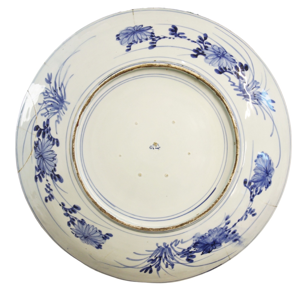 A large Japanese Arita porcelain blue and white charger, Meiji period (1868-1912), of circular - Image 3 of 3