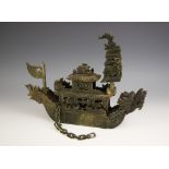 A Chinese carved spinach soapstone model of a Dragon Boat (Junk), 20th century, the bow designed