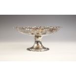 An Edwardian silver pedestal dish, Charles Stuart Harris, London 1903, the cast scrolling foliate