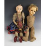 A collection of antique dolls and doll parts, comprising: a papier-mache shoulder head doll, 19th