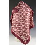 A Christian Dior silk scarf, in maroon monogram, with rolled hem, 77cm x 77cm, along with a
