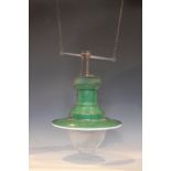 An enamelled railway station pendant oil lamp, early 20th century, the green and white shade of dish