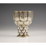 An Edwardian silver chalice of small proportions, Carl Krall, London 1903, the scalloped rim above