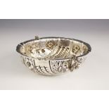 A Victorian silver oval dish, Charles Stuart Harris, London 1893, the moulded rim with twin scroll