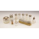 A selection of silver mounted dressing table items, to include an Edwardian silver mounted jar,