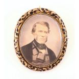 A Victorian miniature portrait mourning brooch, the oval hand embellished portrait of a gentleman
