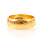 A 22ct yellow gold wedding band, stamped ‘PPLd’ Birmingham, possibly 1987, ring size L, 6.8gms