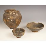 A Roman pottery Cinerary urn, bearing collection label and family inventory states 'found at