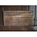 * A carved oak panel inscribed ‘This whole pew belongs to Mr John Symkin living in Plymovth as