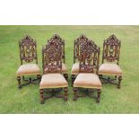 * A set of six walnut William and Mary style dining chairs, late 19th century, each with a carved