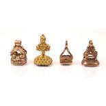 A selection of four late 19th century seal fobs, to include a quartz seal fob example, the