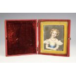 A portrait miniature of young girl, Half length, Watercolour on ivory, Unsigned, Gilt metal framed