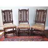 * Three Charles II walnut side chairs, each with coronet finials upon barley twist uprights and a