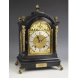 An ebonised and gilt metal bracket clock by Winterhalder & Hofmeier, late 19th century, the arched