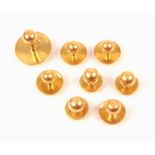 A selection of yellow metal dress studs, the circular plain polished dress studs of various sizes,