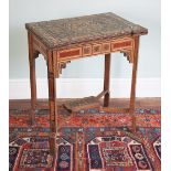 * A Moorish sideli work card table, late 19th/early 20th century, the rectangular inlaid folding top