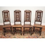 * A set of four Lancashire type panel back stools, early 18th century, each with a pierced scroll