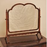 * A Queen Anne style dressing table mirror, early 20th century, the shaped and moulded mirror frame,