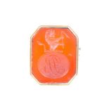 A 19th century carnelian seal ring, the octagonal intaglio with ‘RB’ monogram within oval