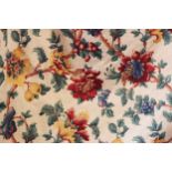 * A pair of interlined floral patten curtains, in red, green, and yellow colourways upon an ivory