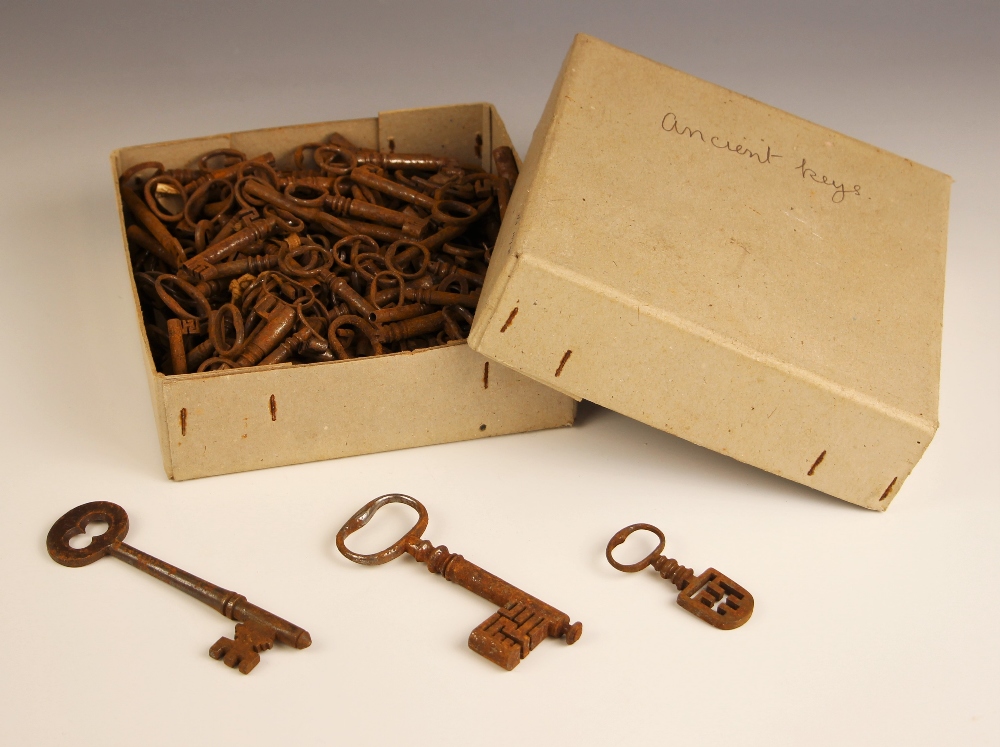 A collection of 17th century and later iron door and furniture keys, the longest 13.5cm (Qty)