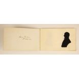 * A Victorian notebook containing seven pasted-in bust length papercut portrait silhouettes, depicti