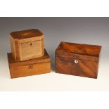 A 19th century mahogany stationery box, the hinged cover centred with a brass cartouche and
